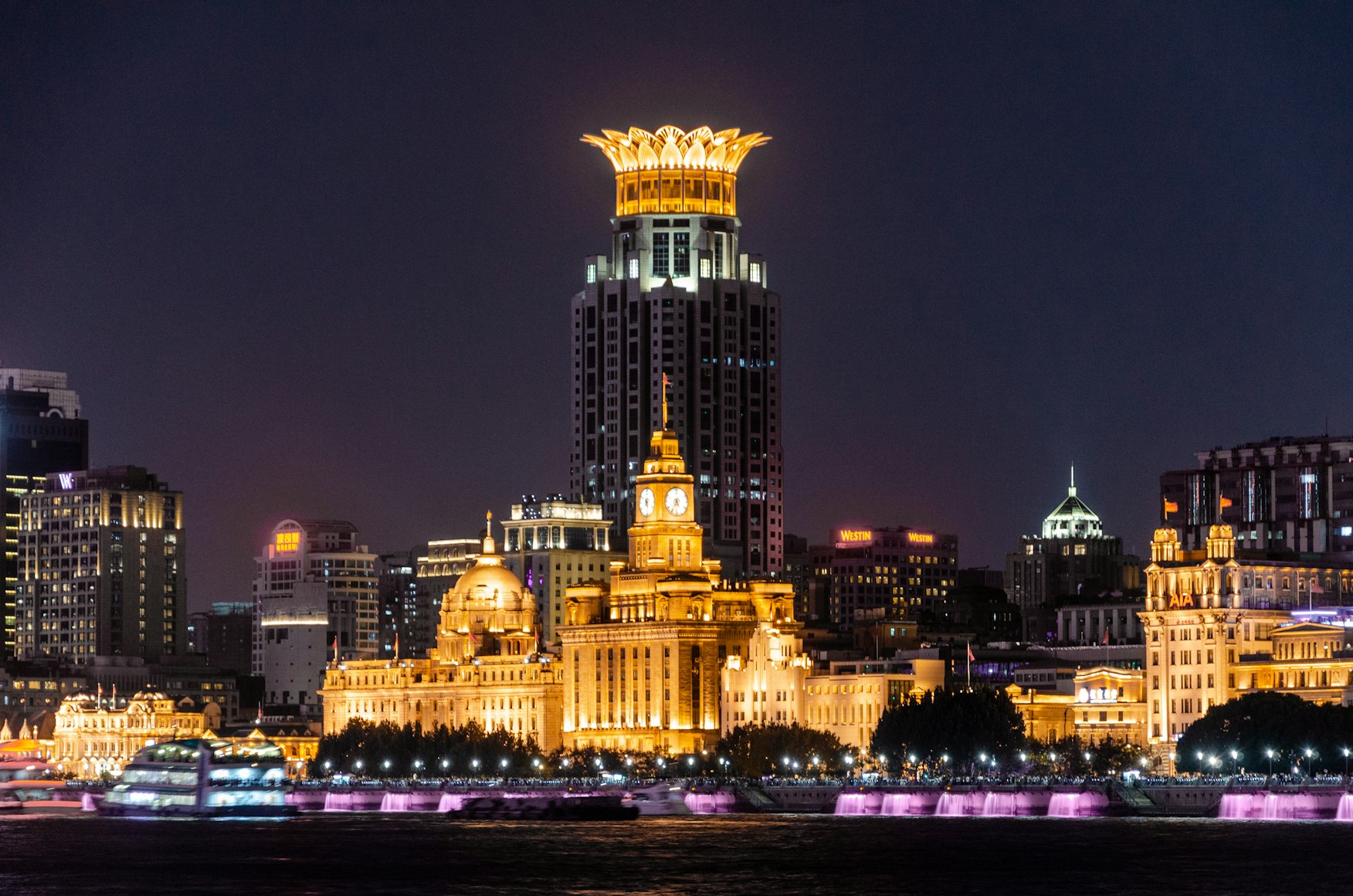 The Bund at night with historic buildings and the Pudong skyline