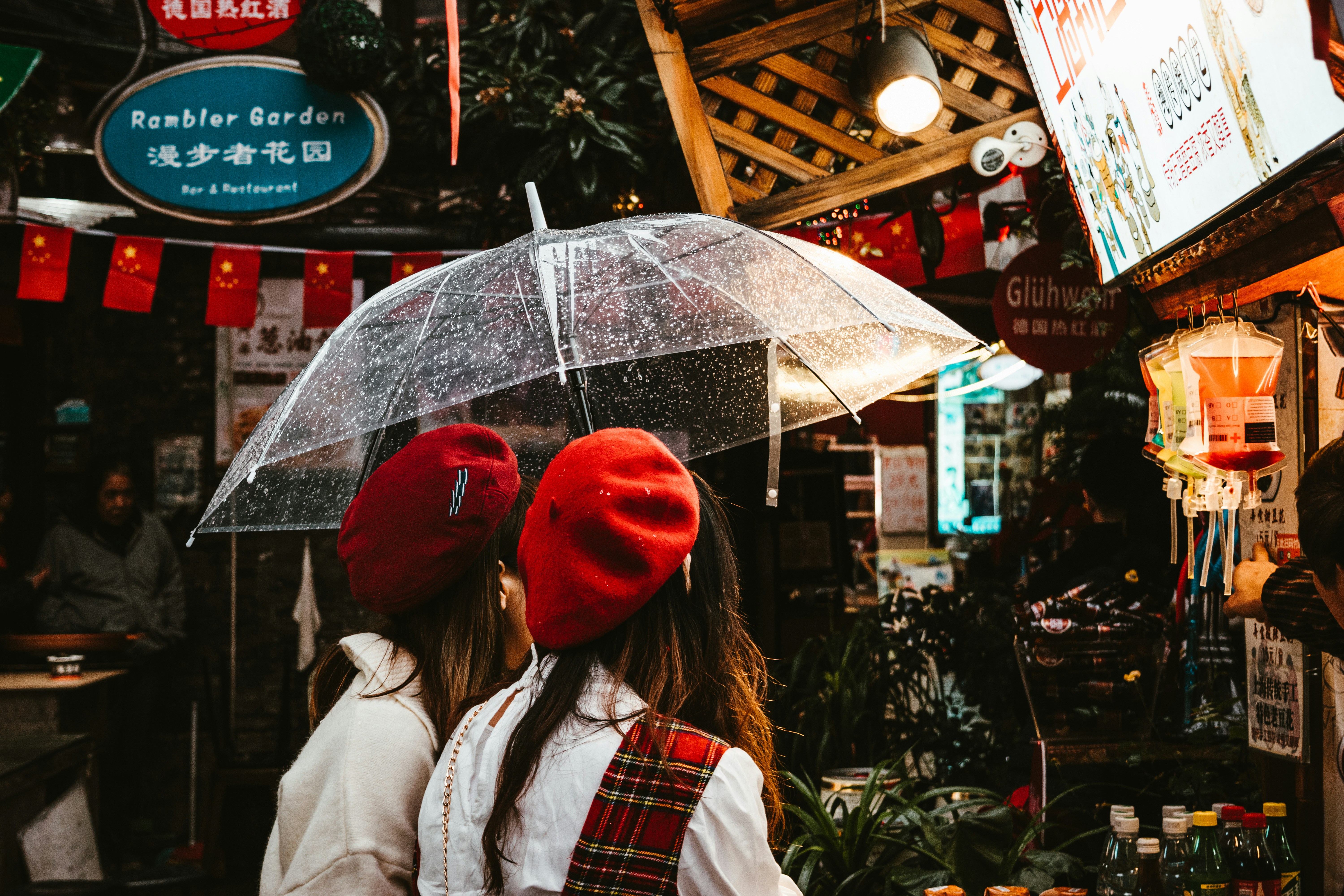 Tianzifang alley with woman holding umbrella